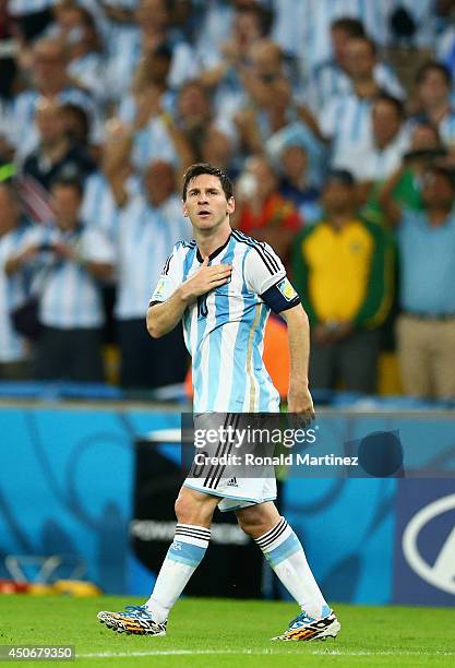 Lionel Messi of Argentina acknowledges the fans after defeating Bosnia and Herzegovina 2-1 in the 2014 FIFA World Cup Brazil Group F match between...