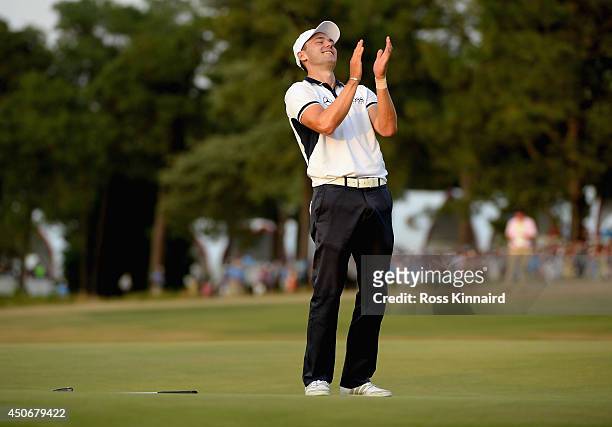 Martin Kaymer of Germany celebrates his eight-stroke victory on the 18th green during the final round of the 114th U.S. Open at Pinehurst Resort &...
