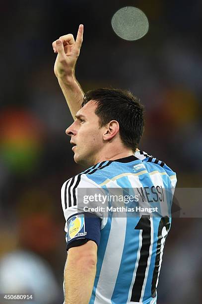 Lionel Messi of Argentina acknowledges the fans after defeating Bosnia Herzegovina 2-1 during the 2014 FIFA World Cup Brazil Group F match between...