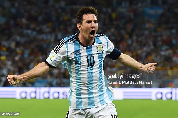 Lionel Messi of Argentina celebrates after scoring his team's second goal during the 2014 FIFA World Cup Brazil Group F match between Argentina and...