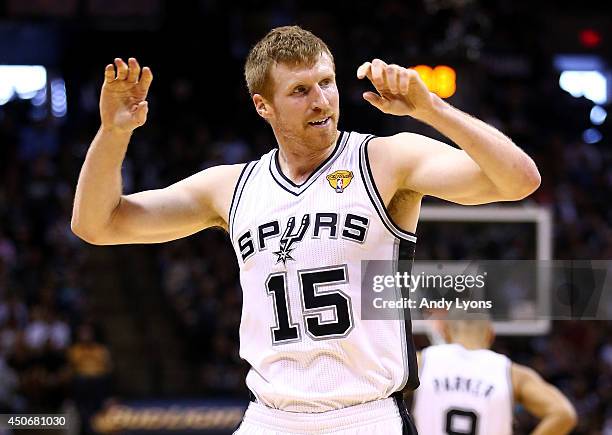 Matt Bonner of the San Antonio Spurs reacts against the Miami Heat during Game Five of the 2014 NBA Finals at the AT&T Center on June 15, 2014 in San...