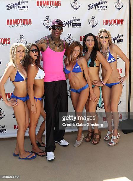 Former NBA player Dennis Rodman and the Sapphire models arrive at Sapphire Pool & Day Club on June 15, 2014 in Las Vegas, Nevada.