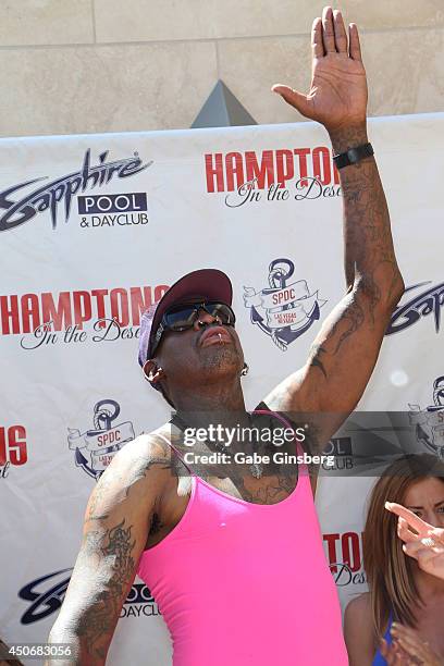 Former NBA player Dennis Rodman dances as he arrives at Sapphire Pool & Day Club on June 15, 2014 in Las Vegas, Nevada.