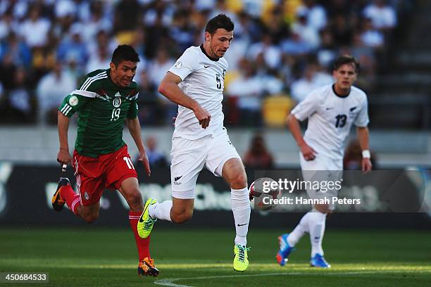 Tommy Smith of New Zealand makes a break during leg 2 of the FIFA World Cup Qualifier match between the New Zealand All Whites and Mexico at Westpac...