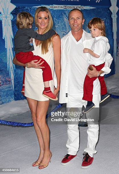 Professional beach volleyball players Kerri Walsh Jennings and Casey Jennings pose with their children at the premiere of Walt Disney Animation...