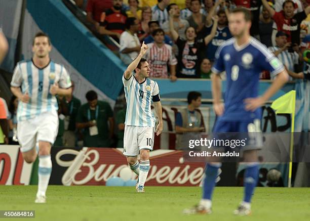 Argentina player Messi celebrates after scoring during the 2014 FIFA World Cup Brazil Group F match between Argentina and Bosnia-Herzegovina at...