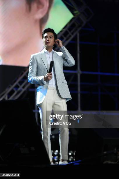 Lee Min-Ho performs on stage during a fans meeting at Beijing Capital Gymnasium on June 15, 2014 in Beijing, China.