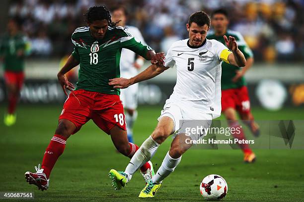 Carlos Pena of Mexico defends against Tommy Smith of New Zealand during leg 2 of the FIFA World Cup Qualifier match between the New Zealand All...