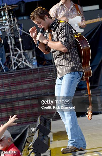Singer/Songwriter Easton Corbin performs during the first annual Florida Country Superfest - Day 2 at EverBank Field on June 15, 2014 in...
