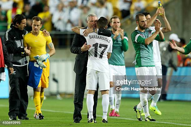Coach Ricki Herbert of New Zealand hugs Kosta Barbarouses during leg 2 of the FIFA World Cup Qualifier match between the New Zealand All Whites and...