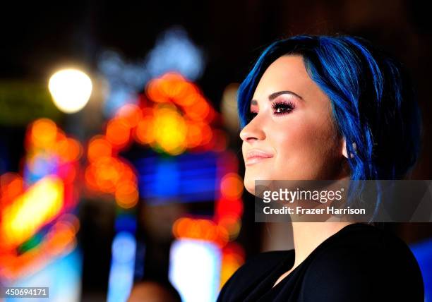 Actress Demi Lovato attends the premiere of Walt Disney Animation Studios' 'Frozen'at the El Capitan Theatre on November 19, 2013 in Hollywood,...