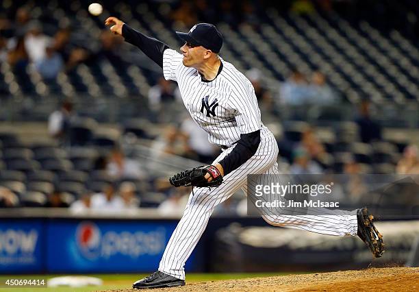 Alfredo Aceves of the New York Yankees in action against the Seattle Mariners at Yankee Stadium on June 2, 2014 in the Bronx borough of New York...
