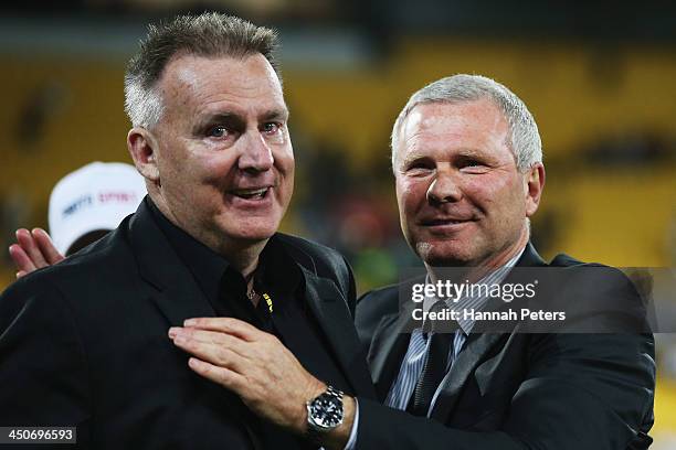 Coach Ricki Herbert of New Zealand thanks manager Brian Turner after losing leg 2 of the FIFA World Cup Qualifier match between the New Zealand All...