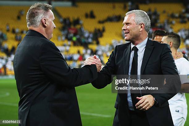 Coach Ricki Herbert of New Zealand thanks manager Brian Turner after losing leg 2 of the FIFA World Cup Qualifier match between the New Zealand All...