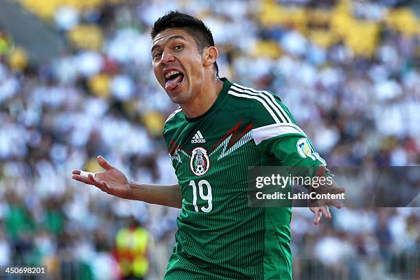 Oribe Peralta of Mexico celebrates scoring the opening goal during leg 2 of the FIFA World Cup Qualifier match between the New Zealand All Whites and...