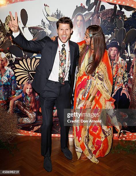 Jason Dundas and Camilla Franks pose at the "Camilla World" for David Jones launch event on November 20, 2013 in Sydney, Australia.