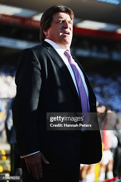 Coach Miguel Herrera of Mexico sings the national anthem during leg 2 of the FIFA World Cup Qualifier match between the New Zealand All Whites and...