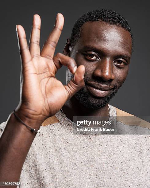 Actor Omar Sy is photographed for Sueddeutsche Zeitung magazine on March 19, 2013 in Munich, Germany.