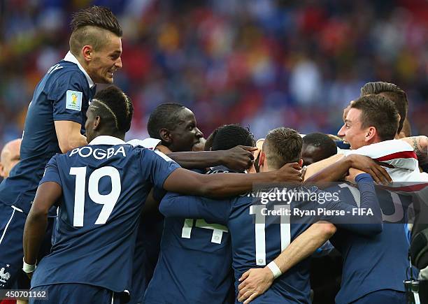 Mathieu Debuchy of France celebrates after a shot from Karim Benzema of France went in off Noel Valladares of Honduras to score an own goal during...