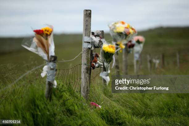 Floral tributes overlook Saddleworth Moor where the body of missing Keith Bennett may be buried on June 16, 2014 in Saddleworth, United Kingdom....