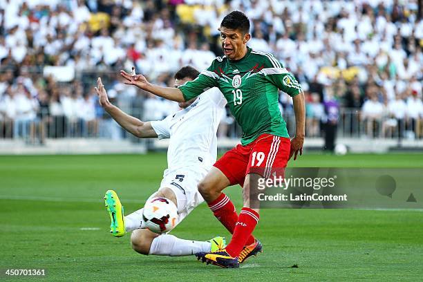 Oribe Peralta of Mexico scores a goal during leg 2 of the FIFA World Cup Qualifier match between the New Zealand All Whites and Mexico at Westpac...
