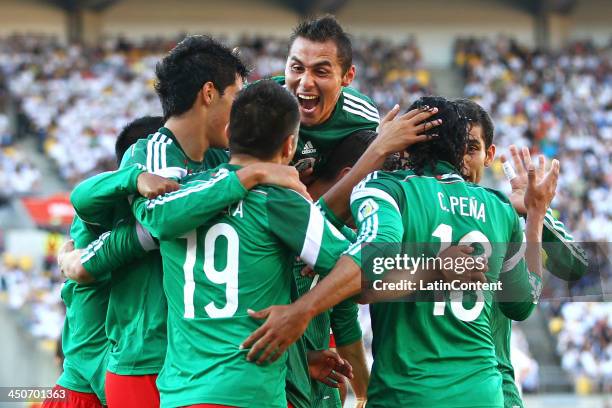 The Mexican players celebrate Oribe Peralta's goal during leg 2 of the FIFA World Cup Qualifier match between the New Zealand All Whites and Mexico...