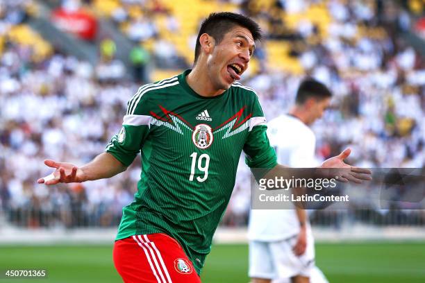 Oribe Peralta of Mexico celebrates scoring the opening goal during leg 2 of the FIFA World Cup Qualifier match between the New Zealand All Whites and...
