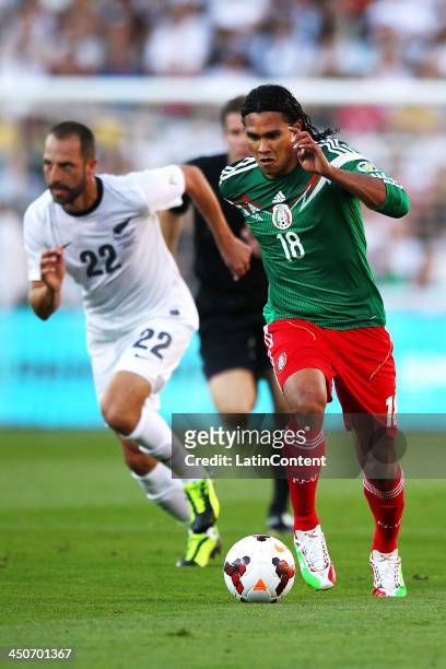 Carlos Pena of Mexico gets past Andrew Durante of New Zealand during leg 2 of the FIFA World Cup Qualifier match between the New Zealand All Whites...
