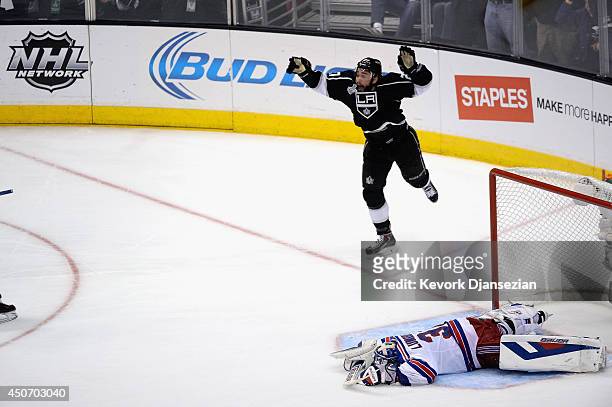 Alec Martinez of the Los Angeles Kings celebrates after scoring the game-winning goal in double overtime against goaltender Henrik Lundqvist of the...