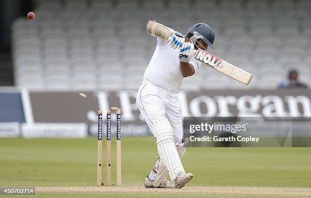 Kumar Sangakkara of Sri Lanka is bowled by James Anderson of England during day five of 1st Investec Test match between England and Sri Lanka at...
