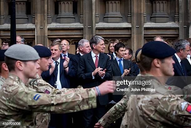 Philip Hammond Secretary of State for Defence Philip Hammond greets Personnel from 7 Armoured Brigade as they parade to a reception at the Houses of...