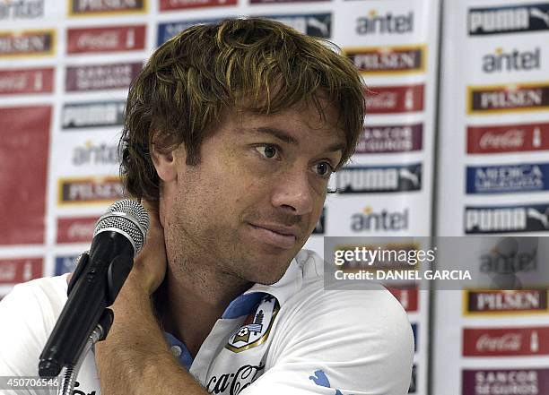 Uruguay's defender Diego Lugano speaks during a press conference in Sete Lagoas, Minas Gerais, Brazil on June 16, 2014. Uruguay prepares for their...