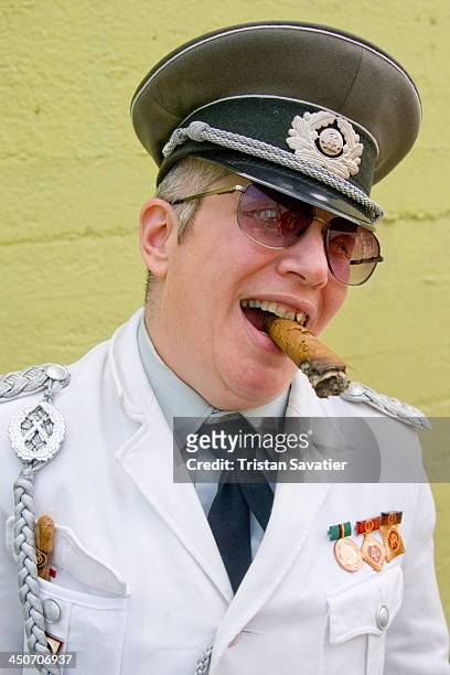 Woman dressed-up as an East German Army Officer, at the Dore Alley - Up Your Alley Fair . Dore Alley - Up Your Alley Fair is an annual BDSM / Fetish...