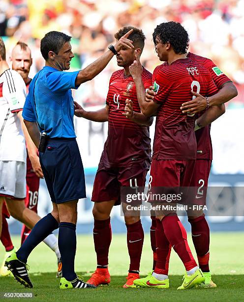 Pepe of Portugal is shown the red card by referee Milorad Mazic and is sent off during the 2014 FIFA World Cup Brazil Group G match between Germany...