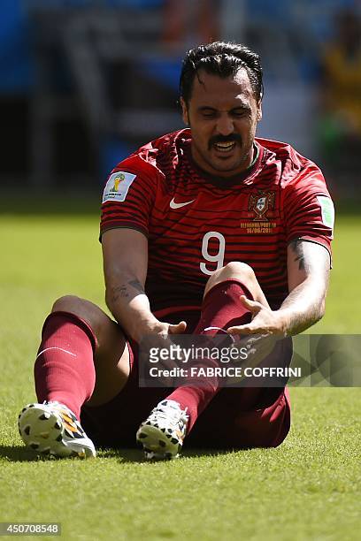 Portugal's forward Hugo Almeida reacts during the Group G football match between Germany and Portugal at the Fonte Nova Arena in Salvador on June 16...