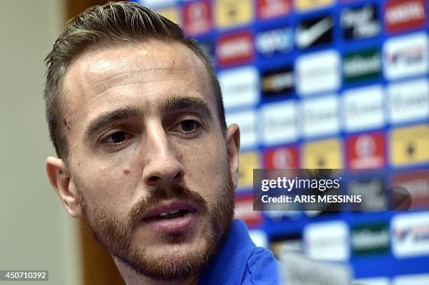 Greece's goalkeeper Panagiotis Glykos speaks during a press conferense in Aracaju on June 16 three days before their 2014 FIFA World Cup Group C...