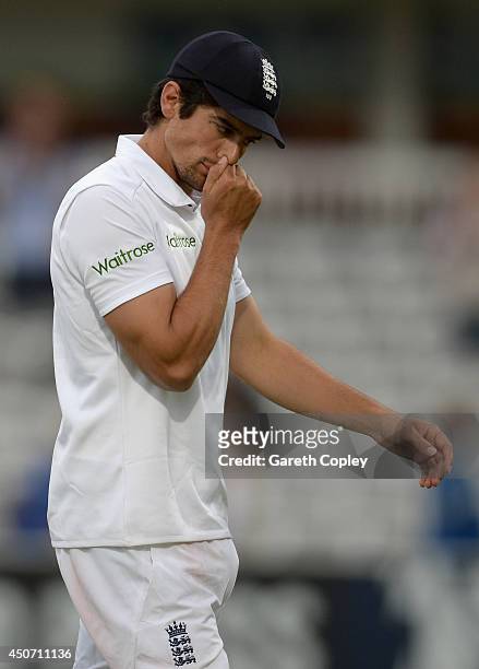 England captain Alastair Cook leaves the field after drawing 1st Investec Test match between England and Sri Lanka at Lord's Cricket Ground on June...