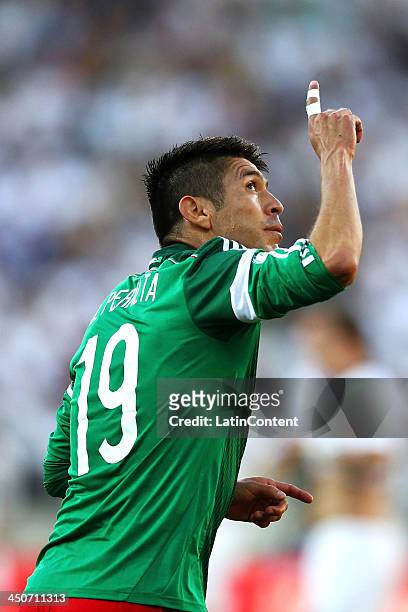 Oribe Peralta of Mexico celebrates scoring a goal during leg 2 of the FIFA World Cup Qualifier match between the New Zealand All Whites and Mexico at...
