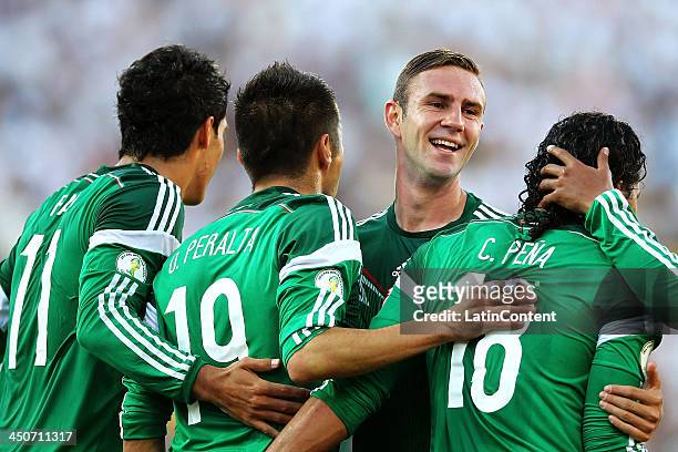 Miguel Layun of Mexico celebrates Oribe Peralta's goal during leg 2 of the FIFA World Cup Qualifier match between the New Zealand All Whites and...