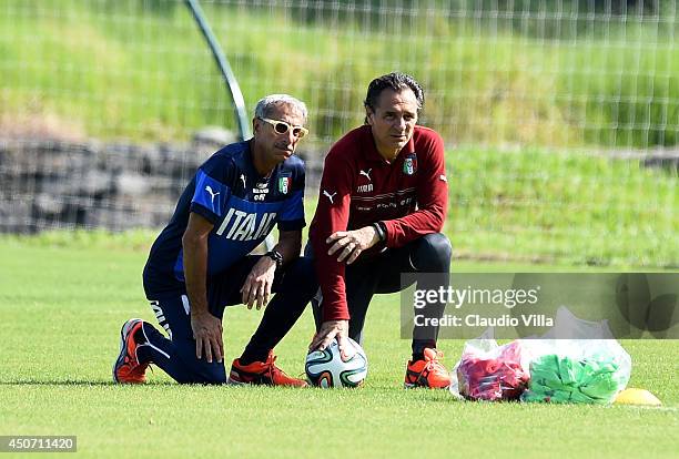 Medical doctor Enrico Castellacci and Italy head coach Cesare Prandelli look on during a training session on June 16, 2014 in Rio de Janeiro, Brazil.