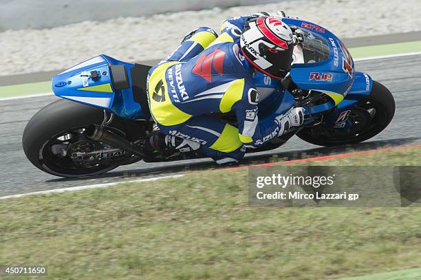 Randy De Puniet of France and Suzuki Test Team rounds the bend during the MotoGp Tests In Montmelo at Circuit de Catalunya on June 16, 2014 in...