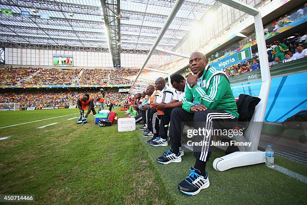 Head coach Stephen Keshi of Nigeria looks on from the bench during the 2014 FIFA World Cup Brazil Group F match between Iran and Nigeria at Arena da...