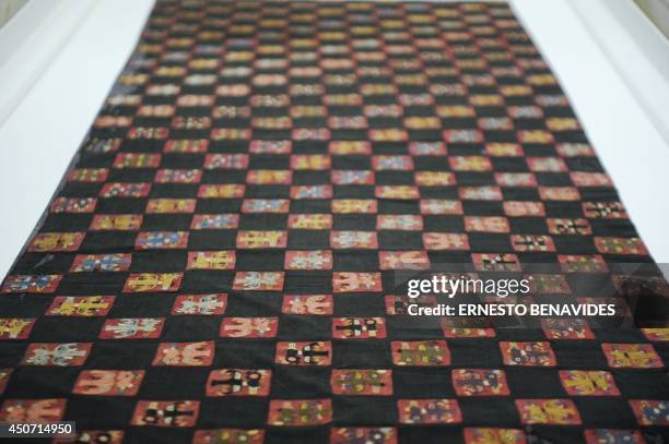 Archaeological textile pieces repatriated from Gothenburg, Sweden are displayed at the Antropology Museum in Lima on June 16, 2014. The Peruvian...