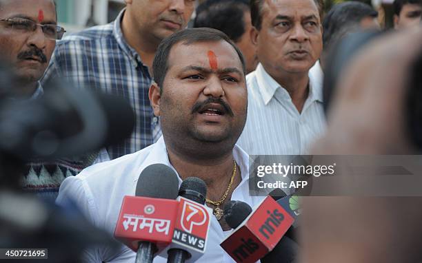 The President of the Ahmedabad Bajrangdal, Jwalit Mehta, , speaks to media during a protest ahead of a scheduled performance by Pakistani singer Atif...