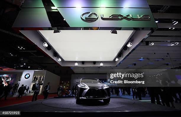 Toyota Motor Corp.'s Lexus LF-NX sport-utility vehicle stands on display at the 43rd Tokyo Motor Show 2013 in Tokyo, Japan, on Wednesday, Nov. 20,...