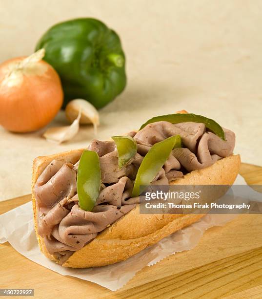 italian beef sandwich with green pepper strips -  firak stock pictures, royalty-free photos & images