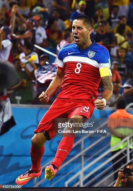 Clint Dempsey of the United States celebrates after scoring the team's first goal during the 2014 FIFA World Cup Brazil Group G match between Ghana...