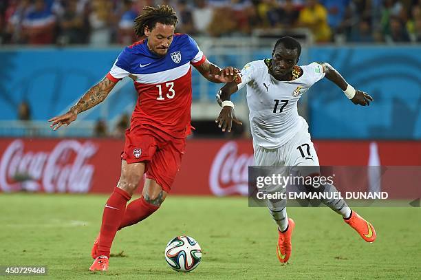Midfielder Jermaine Jones jumps for the ball with Ghana's midfielder Mohammed Rabiu during a Group G football match between Ghana and US at the Dunas...