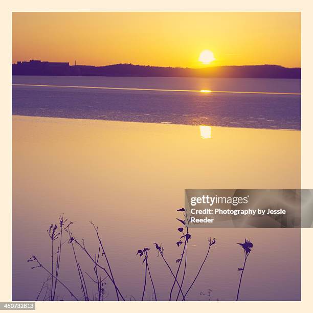 sunset over melting lake - lake mendota stock pictures, royalty-free photos & images