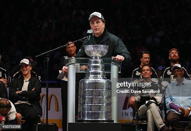 President and General Manager Dean Lombardi of the Los Angeles Kings speaks during the 2014 LA Kings Stanley Cup Championship Parade and Rally on...